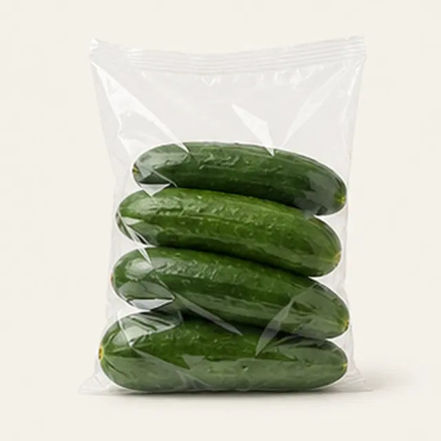 Cucumbers packed in a clear produce bag